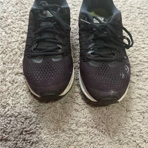 Old and torn Nike Women's Black Running Shoes